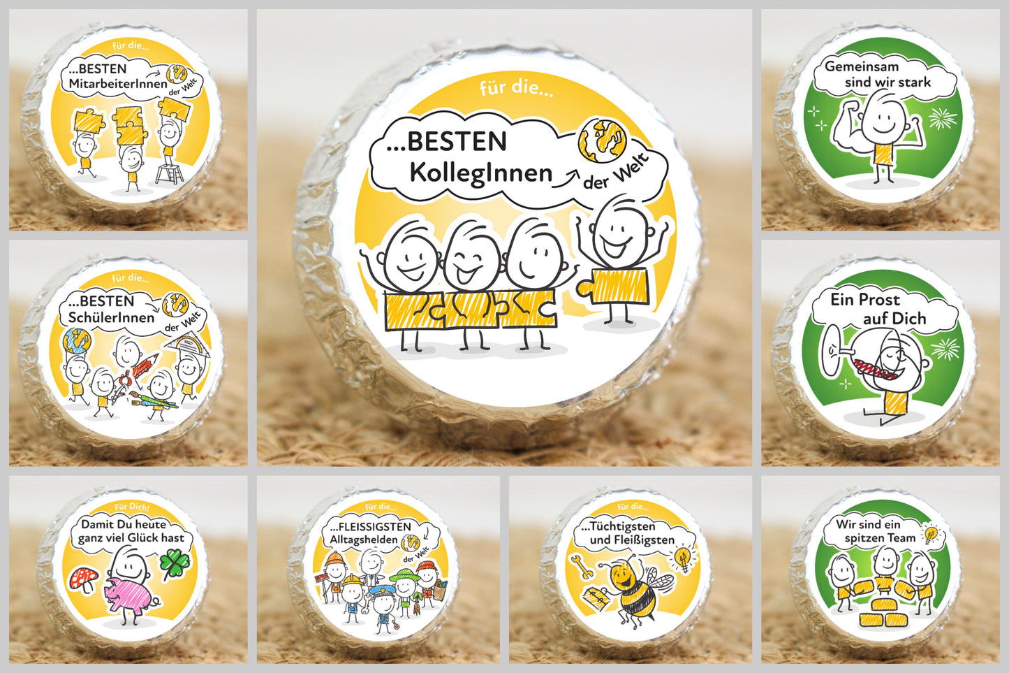 Neun silber verpackte Schokotaler mit verschiedenen Strichmännchen-Motiven und wertschätzenden Sprüchen